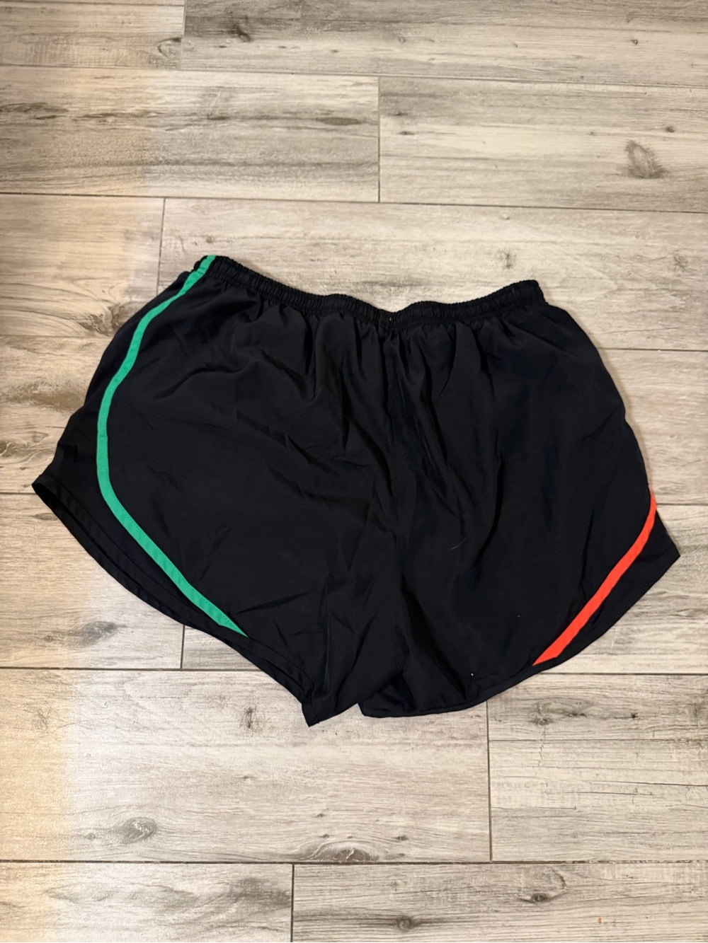 Nike Black Women's Athletic Shorts with Green and Red Side Piping